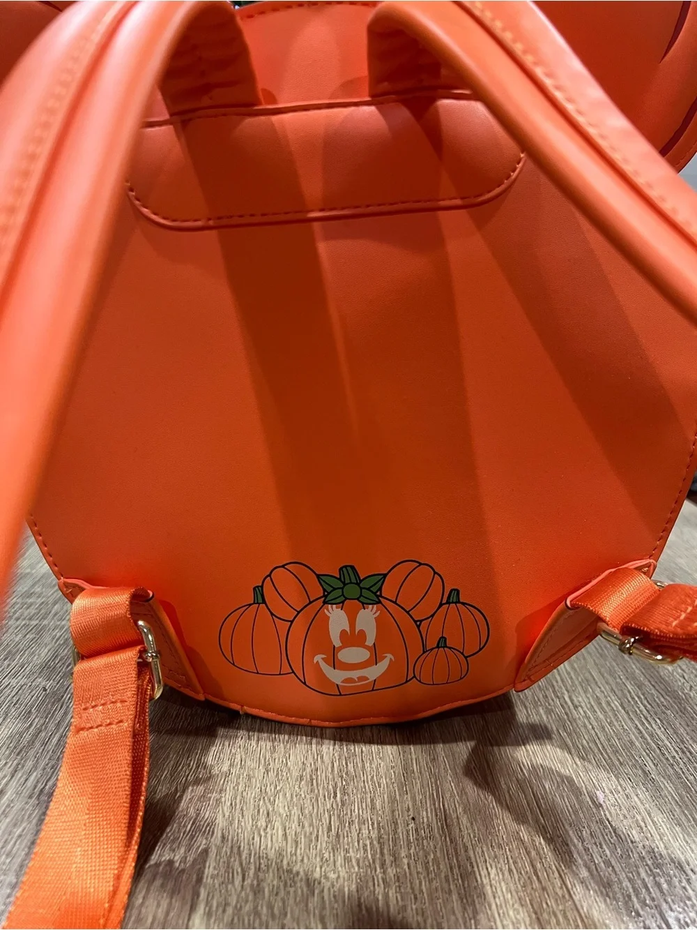 Loungefly Orange Pumpkin Minnie Ear Backpack with Green Bow
